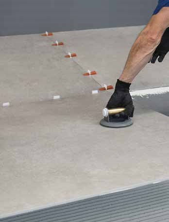 Montaj_Placi_portelanate_mari_Keope Efectiuare_montaj_placi_gresie_dimensiuni_mari